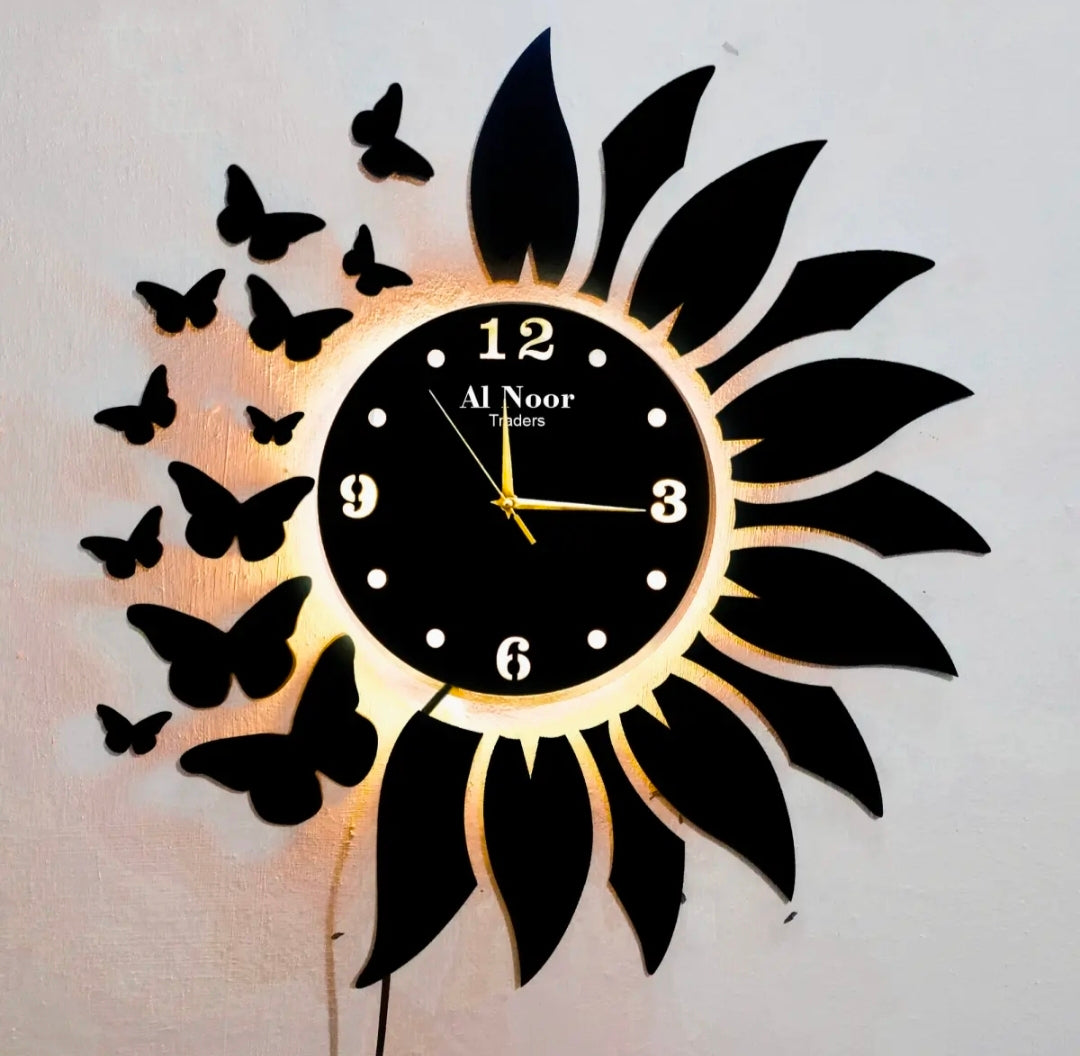 Butter fly leaves wall clock